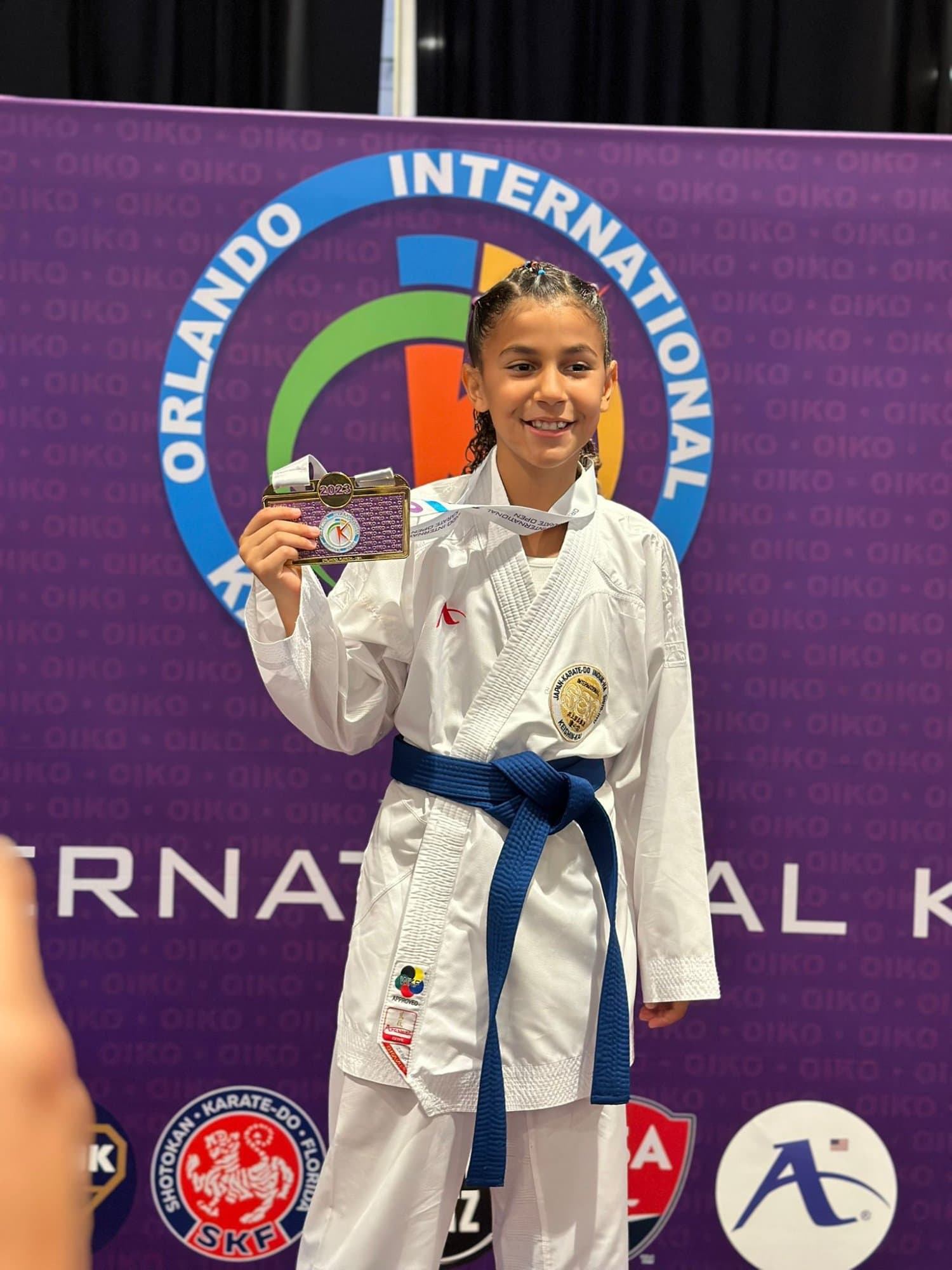 Student Winning Medal at National Tournament