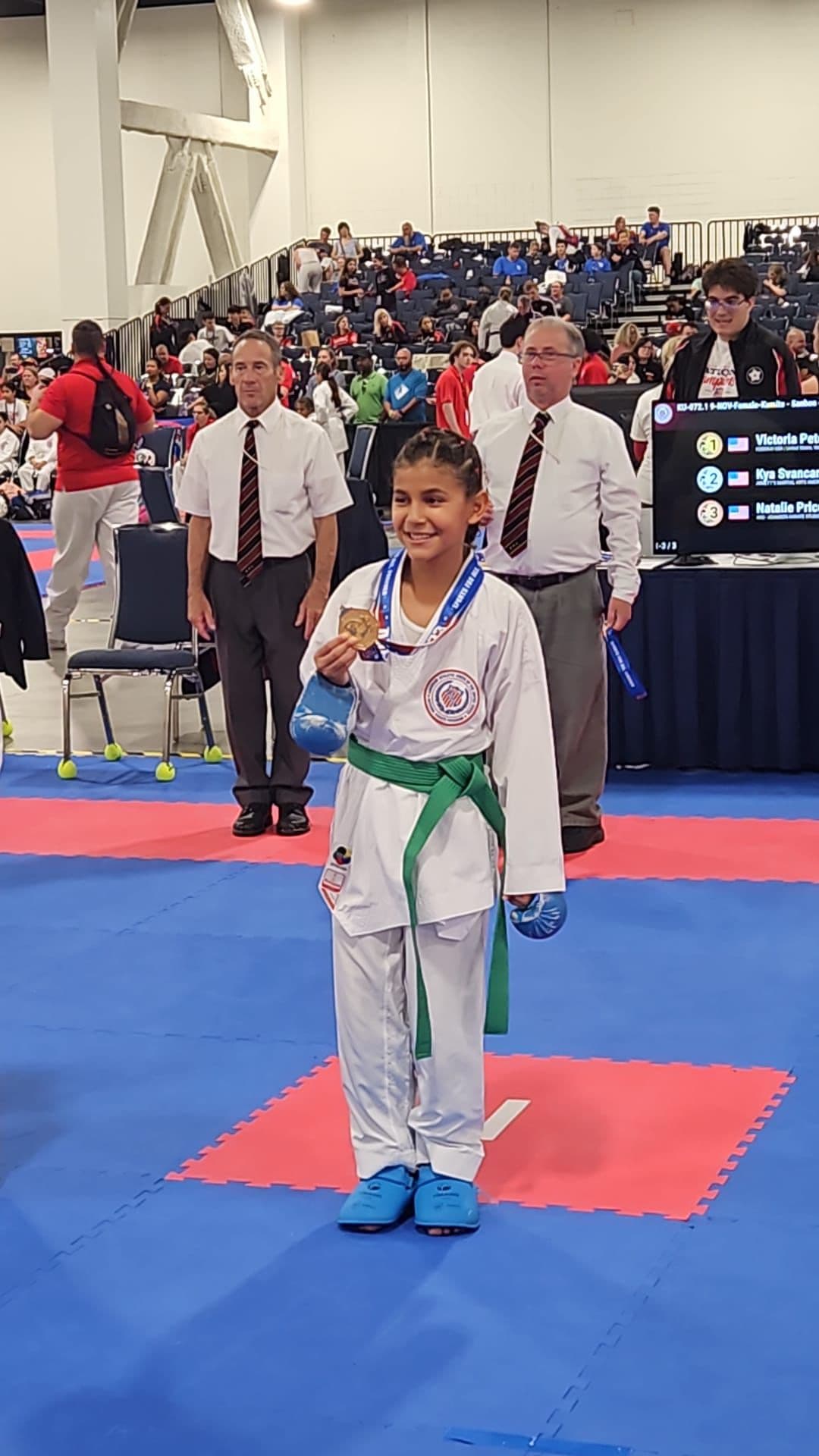 Young student in kata stance